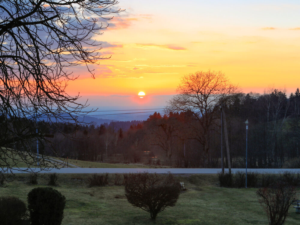 &Uuml;ber den traumhaften Landschaft von Sankt Englmar geht die Sonne unter